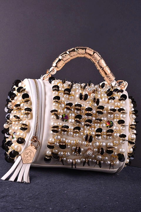What are the overall dimensions of the handbag?