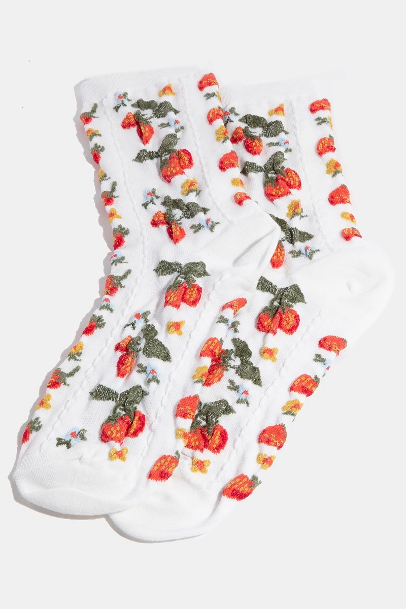 What percentage of polyurethane is in the embroidered socks?