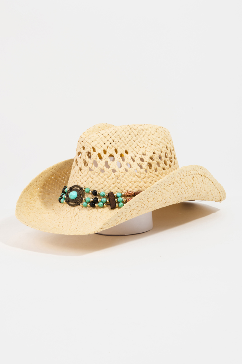 What is the proper way for a woman to wear a cowboy hat?