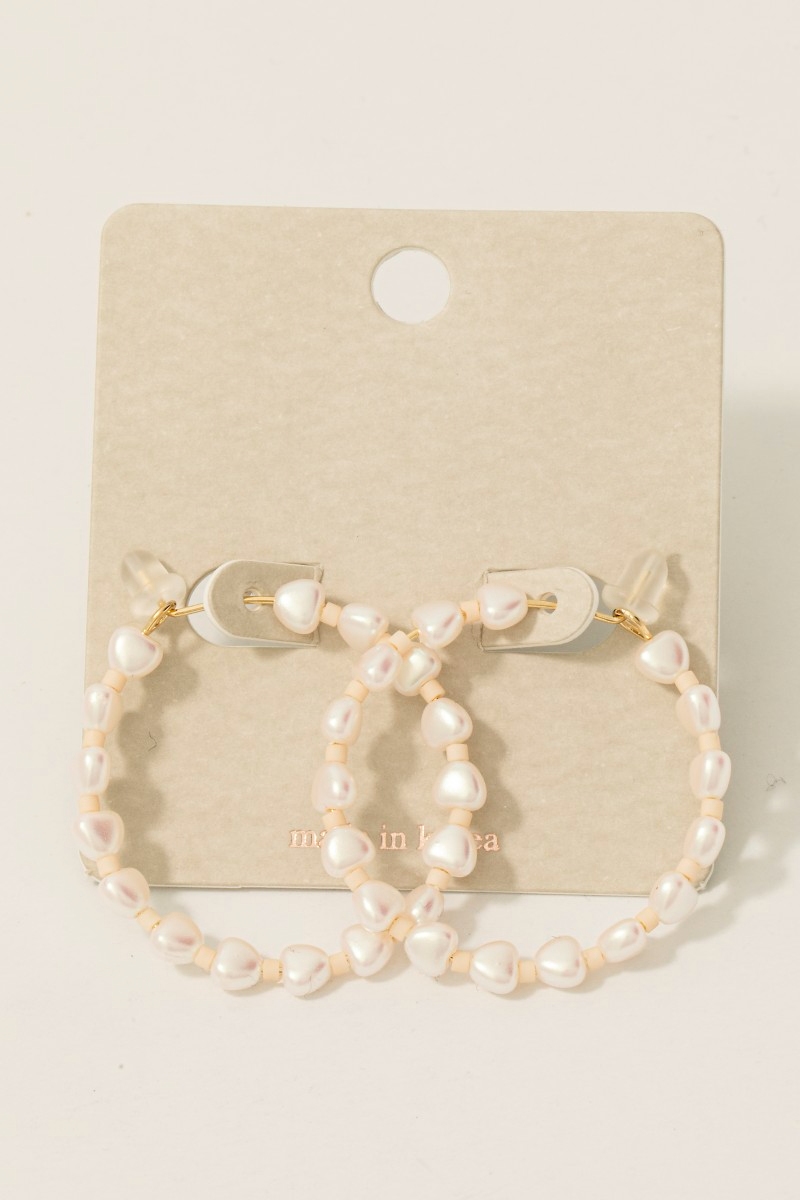 Which collection are these hoop earrings a part of?