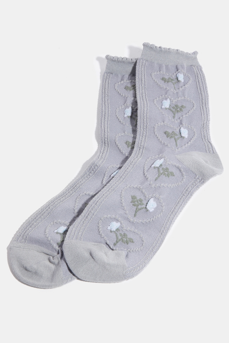 What is the composition of the socks in terms of polyester?